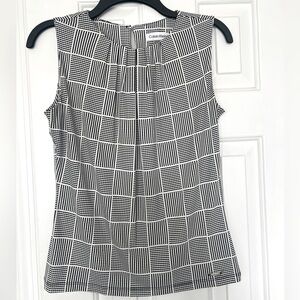 Women’s XS Calvin Klein Black & White Top.Stretchy material.Excellent condition